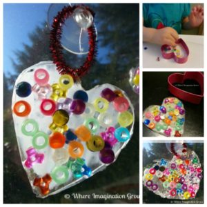 Easy Valentine's Day craft for kids! Make this heart suncatcher craft with just glue and beads! Perfect Valentine's art project for both toddlers and preschoolers!