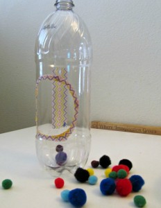 DIY Pom Pom Drop! Fine motor activities for infants and toddlers